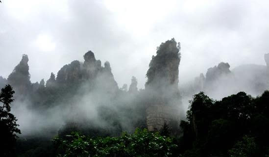 Rain and fog attract tourists at Wulingyuan Scenic Area in Zhangjiajie